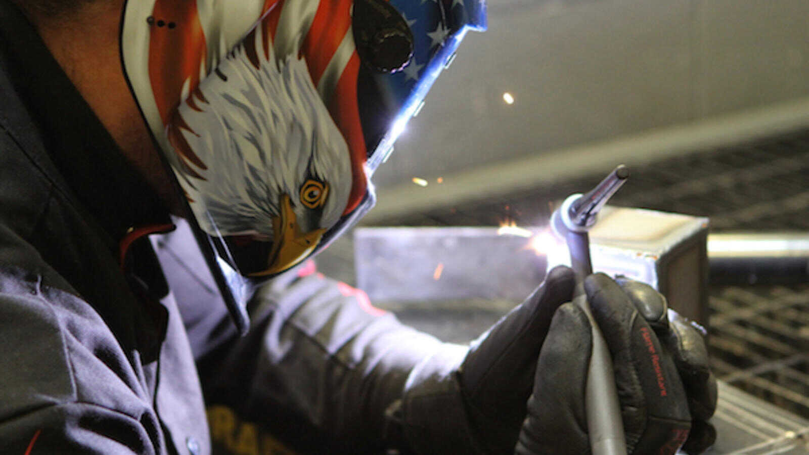 Up close view of a Denver welding student using an ARC welder.