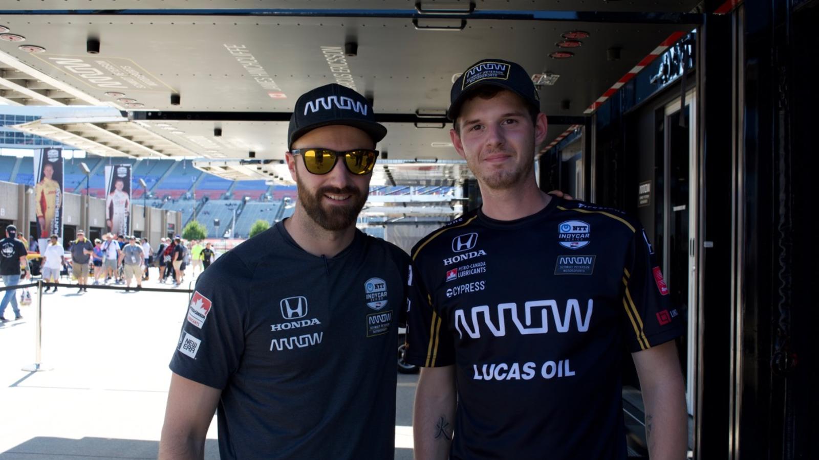 Evan Roberts of the Lincoln Tech Grand Prairie Campus with team driver James Hinchcliffe