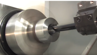 A CNC lathe in action.