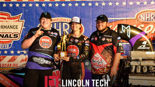 Lincoln Tech studenst John Lipscomb and Beau Fleming Flank Megan Meyer of Randy Meyer Racing at the US Nationals.