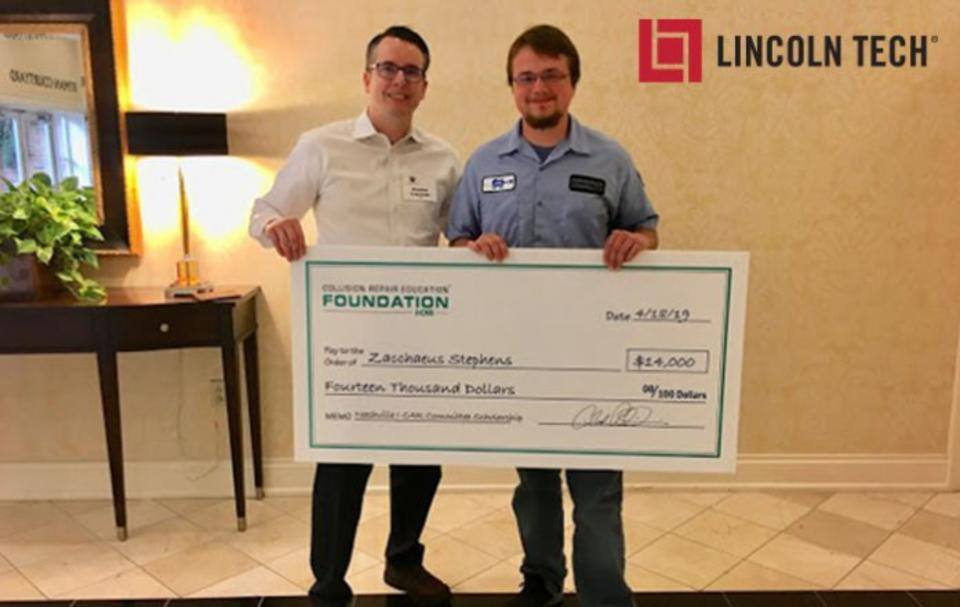 Lincoln Student with scholarship check